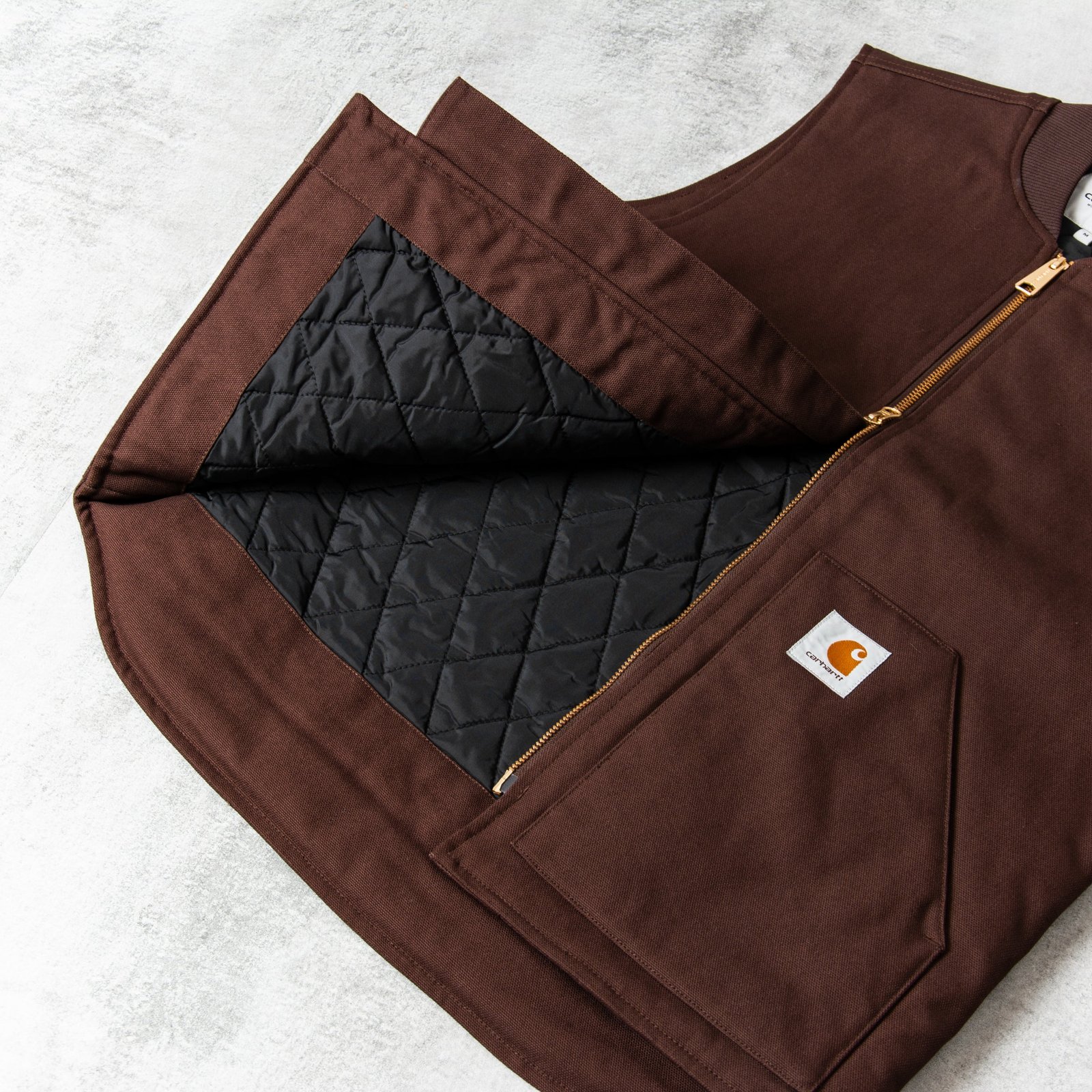 Get the Carhartt WIP Rigid Vest - Tobacco online @Union Clothing